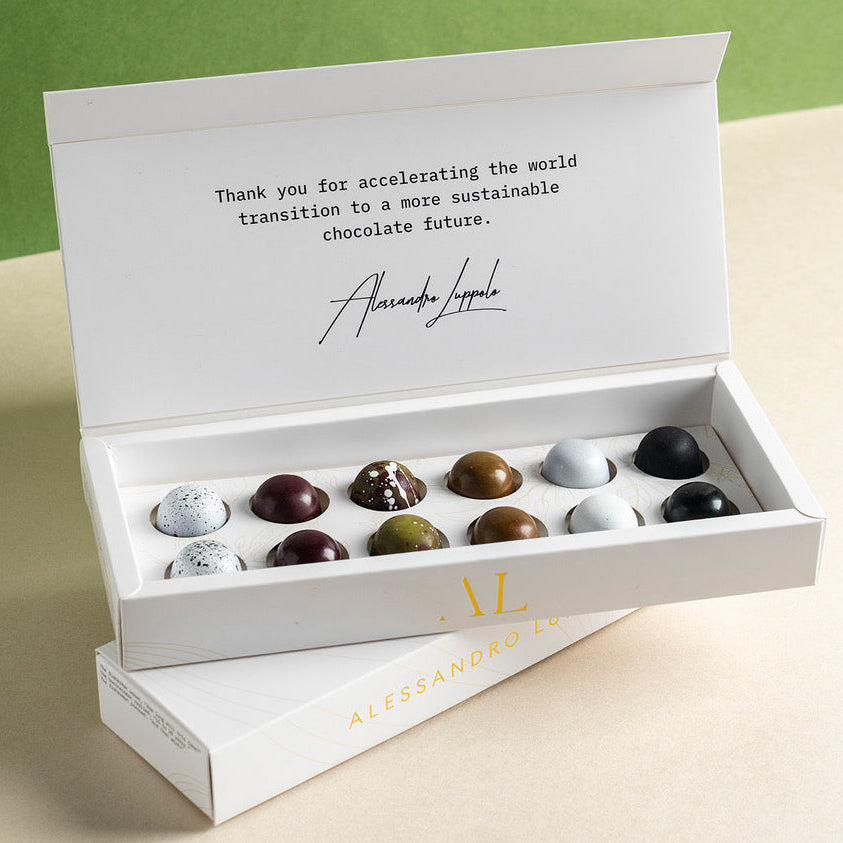 Box of chocolates with a message on a light green background